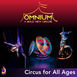 Omnium Circus. Performers hanging from silks and twirling lights.